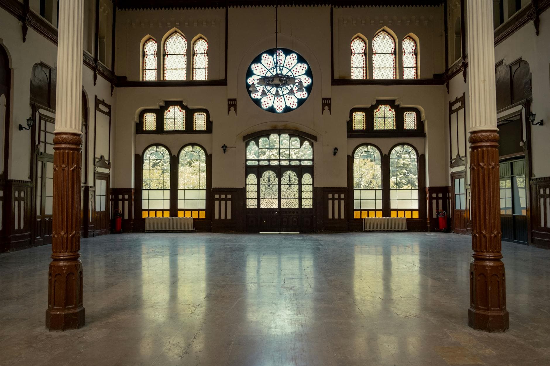 Majestic interior hall of Sirkeci Train Station in Istanbul, showcasing classic architecture.