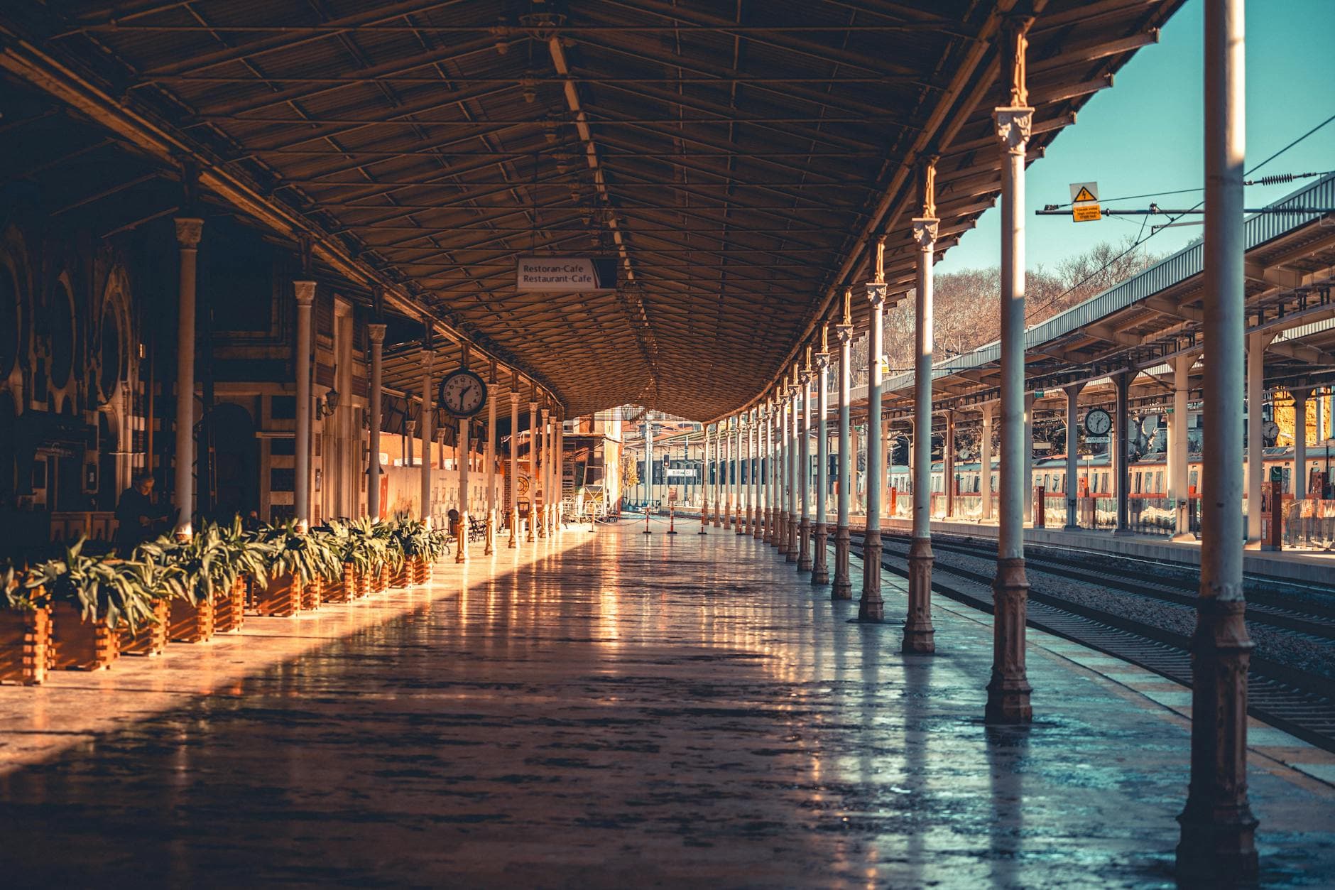 Sunlit view of the historic Sirkeci Train Station in Istanbul, showcasing its classic architecture.