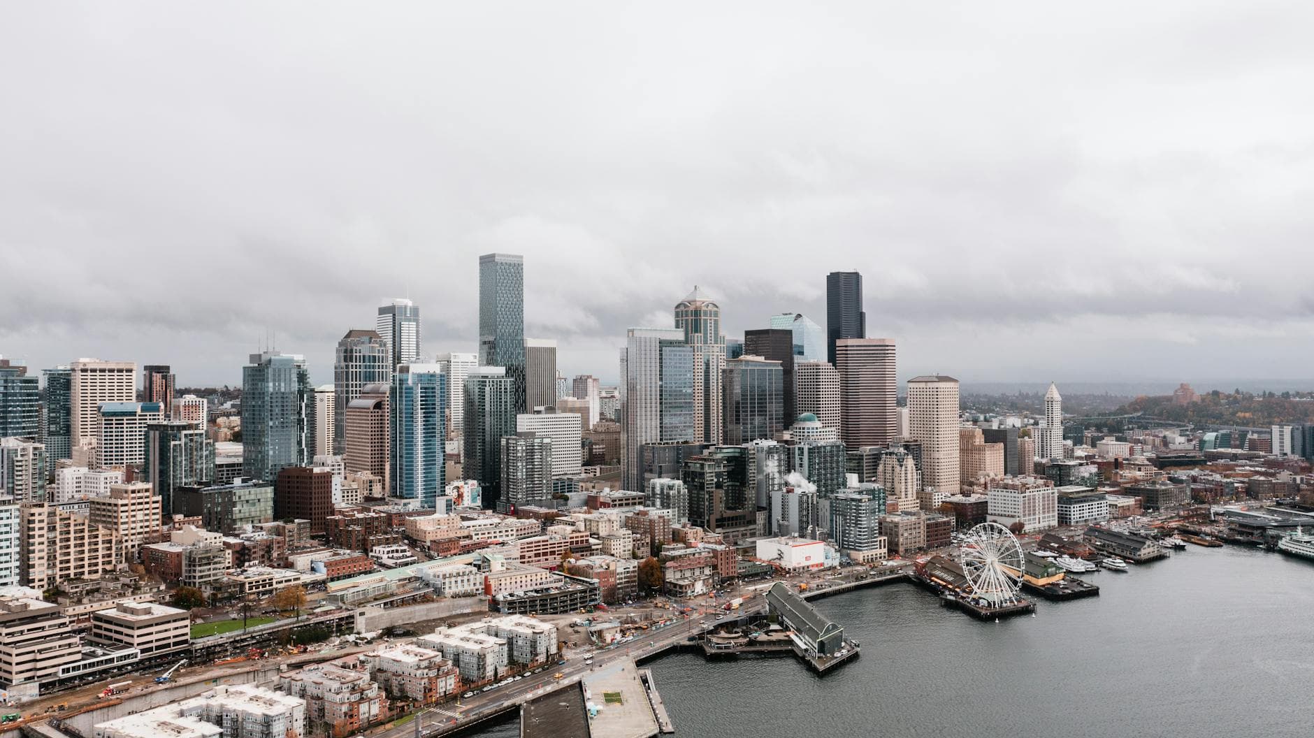 Aerial view of Seattle's downtown skyline featuring iconic skyscrapers and waterfront.