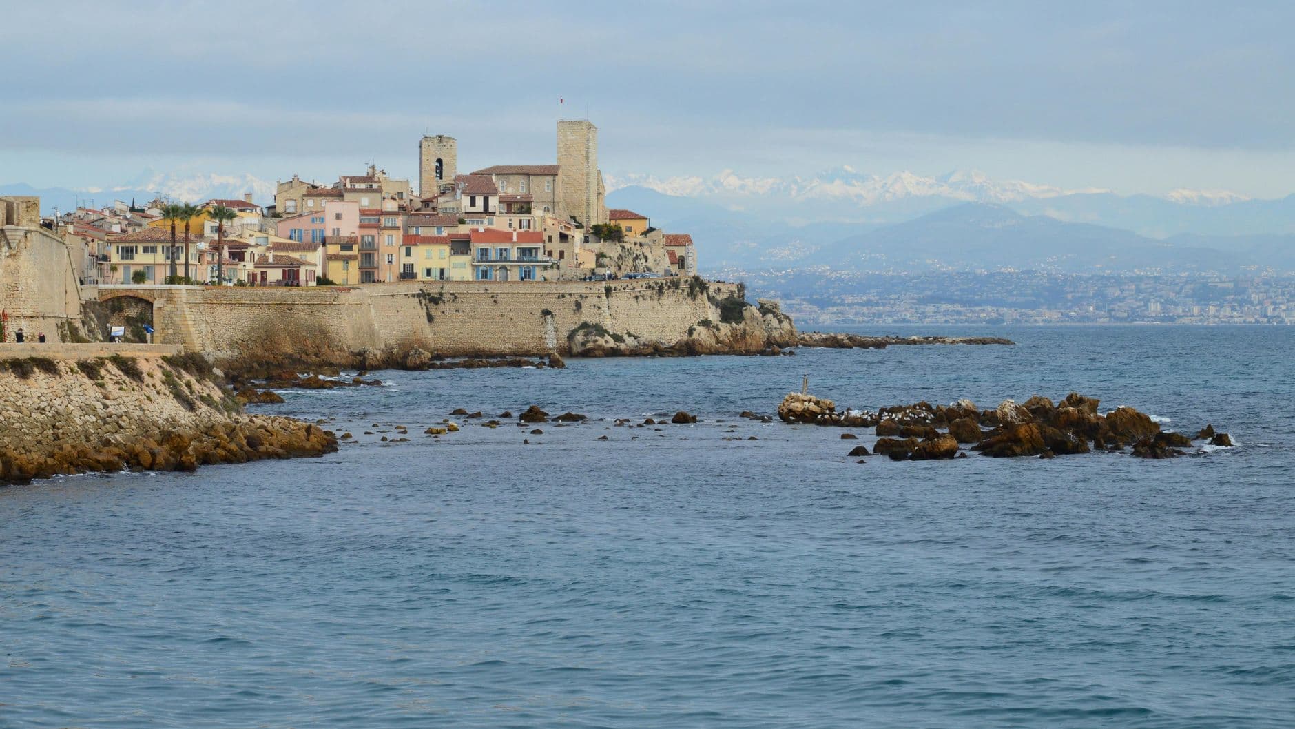 Explore the serene coastal beauty of Antibes with its historic architecture and stunning sea views.
