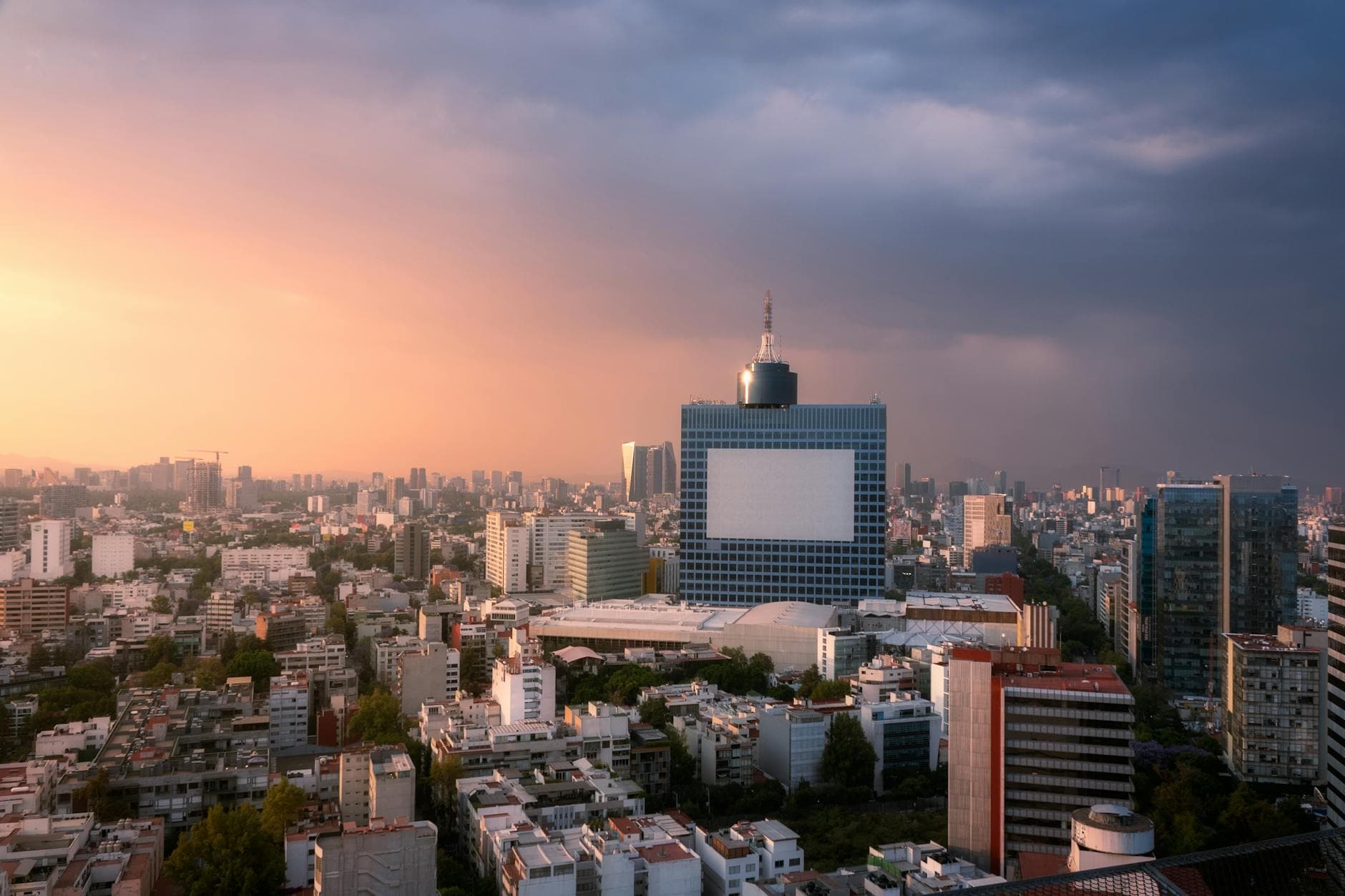 A stunning cityscape view of Mexico City at sunset with skyscrapers.