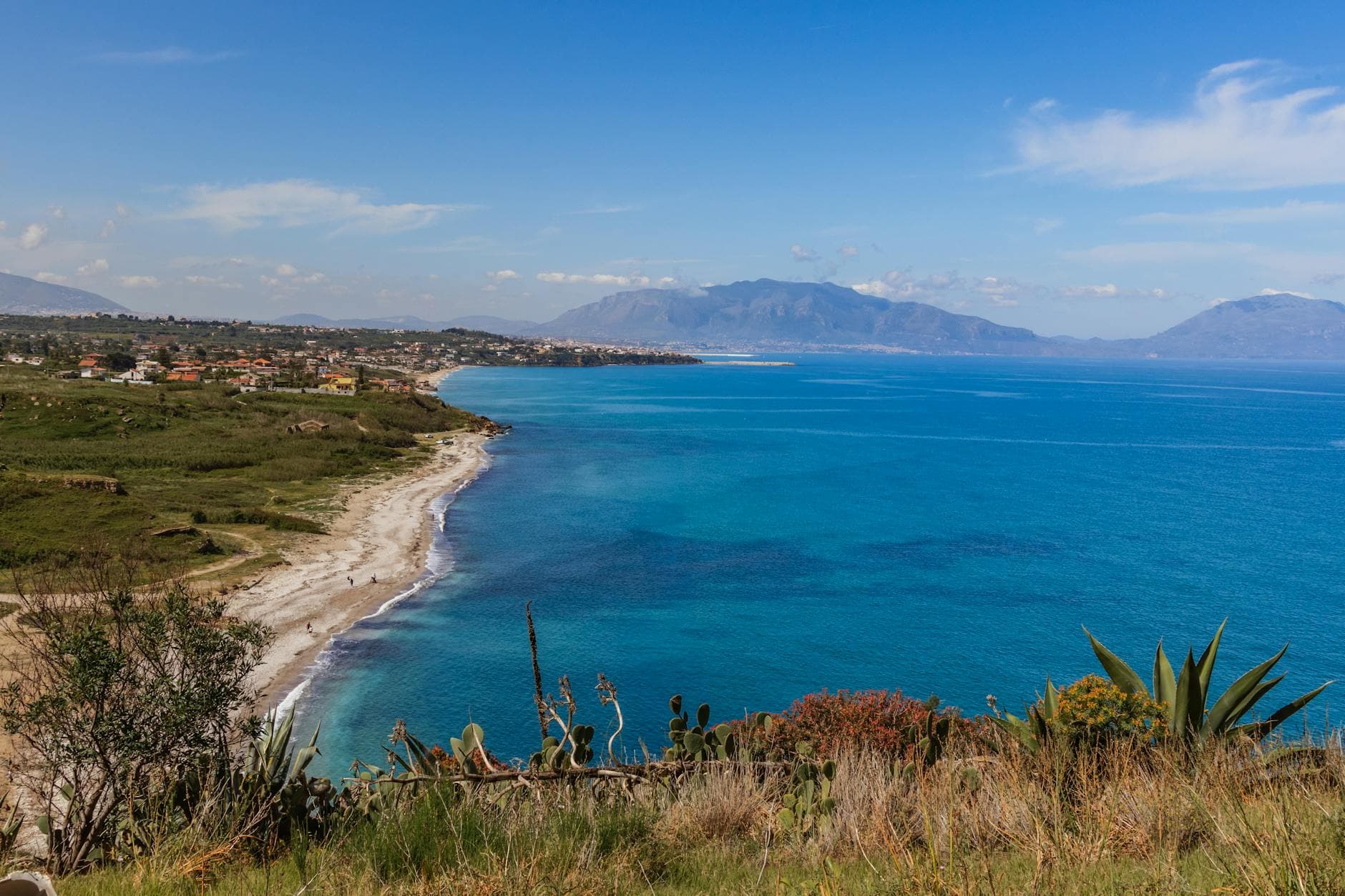 Panoramic view of the beautiful coastline in Terrasini, Sicily with crystal blue waters.