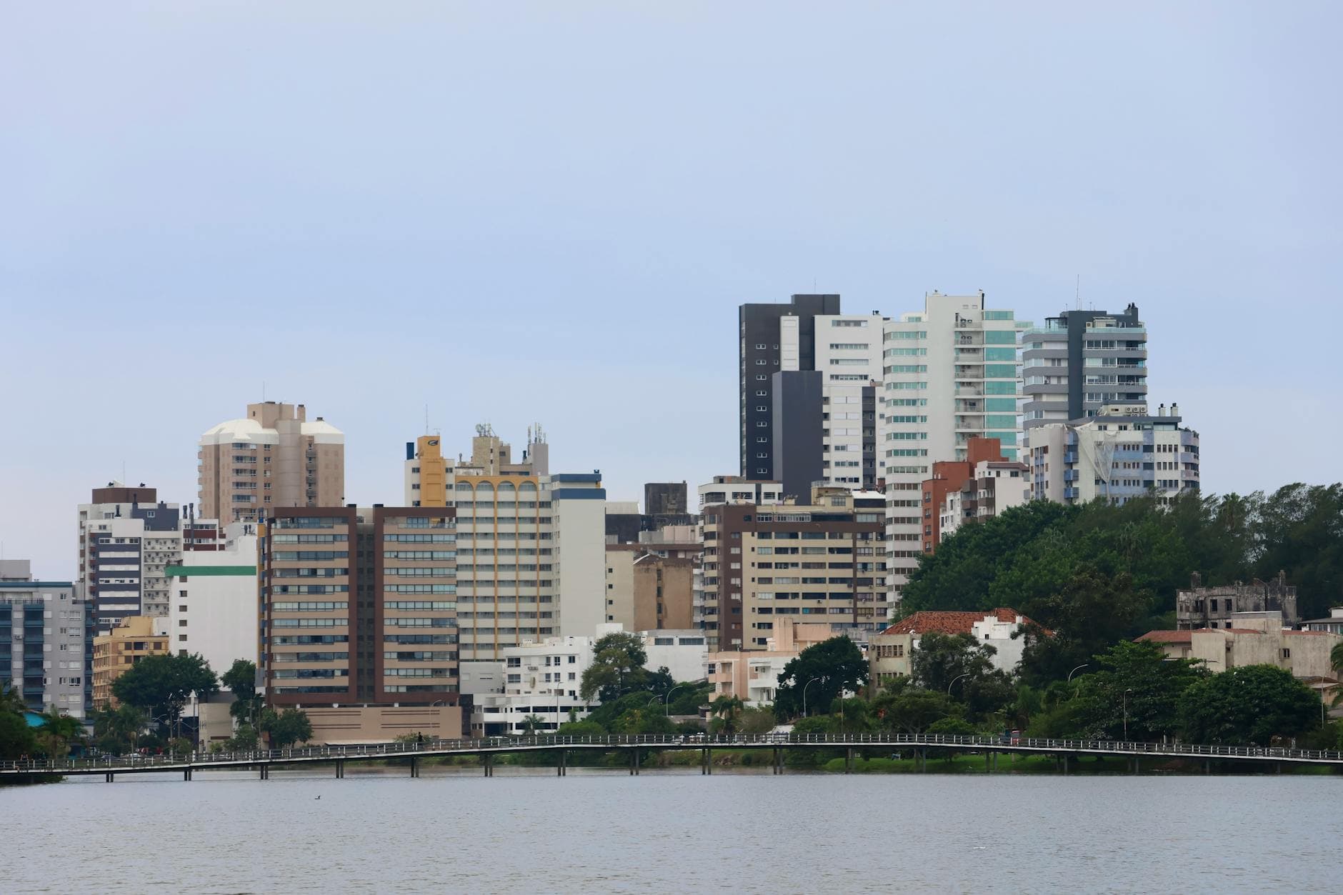 Urban skyline of Tôrres, Brazil, showcasing modern architecture along the waterfront.