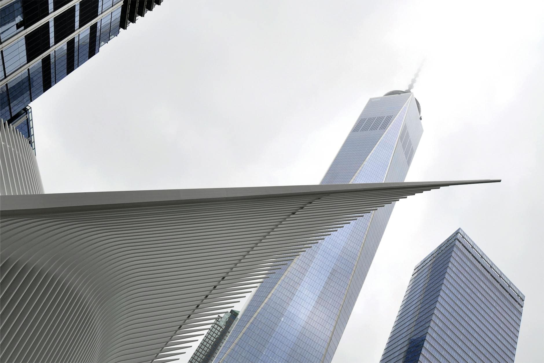 Futuristic view of One World Trade Center and Oculus in New York City.