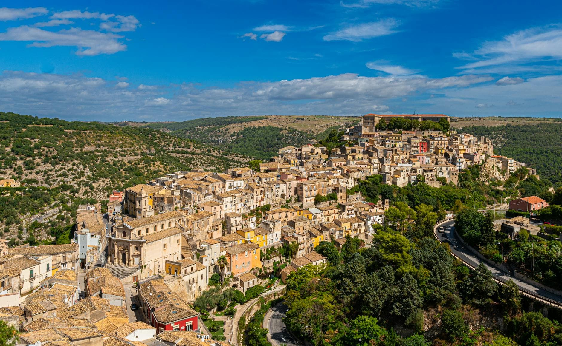 Explore the stunning medieval architecture of Ragusa Ibla in picturesque Sicily, Italy, with this vibrant aerial view.