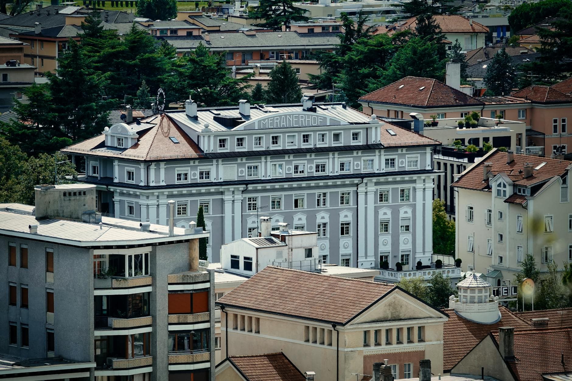 Aerial view of the iconic Meranerhof in Meran, Italy showcasing classic architecture.