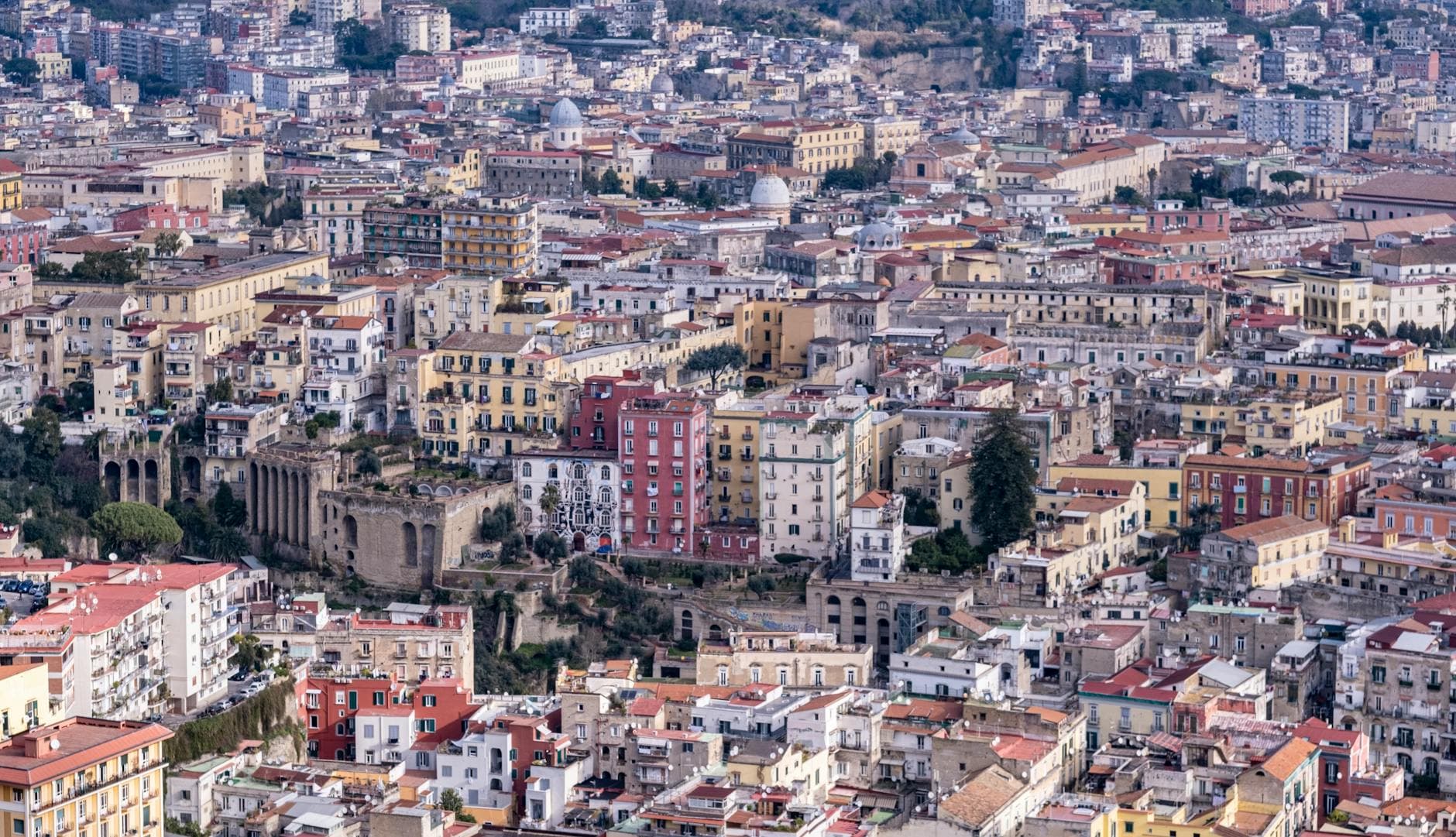 A captivating aerial view of Naples, Italy showcasing historic architecture and vibrant city life.