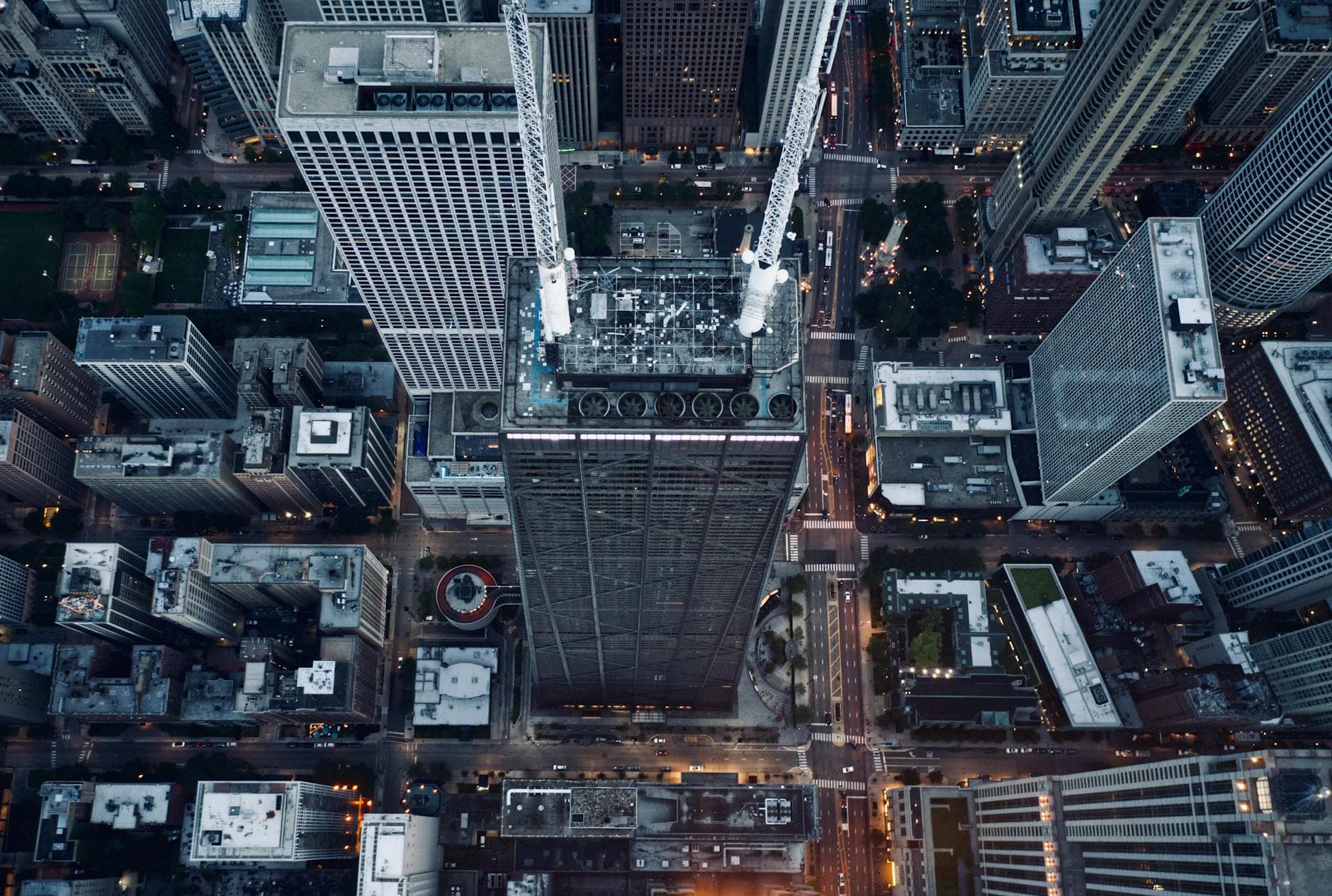 Stunning aerial shot of Chicago's cityscape featuring towering skyscrapers during twilight.