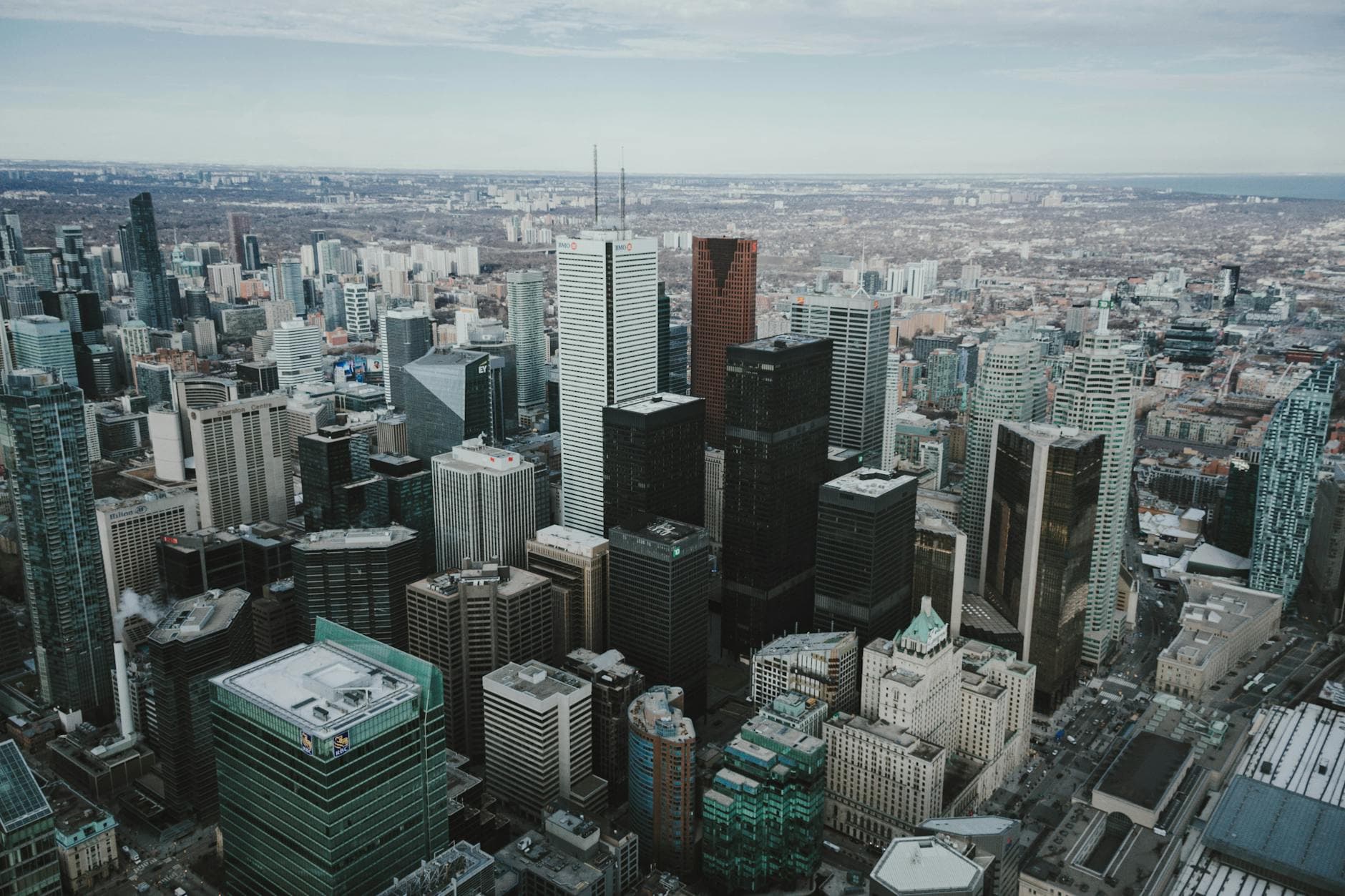 High-angle aerial view showcasing Toronto's iconic urban skyline and architecture.