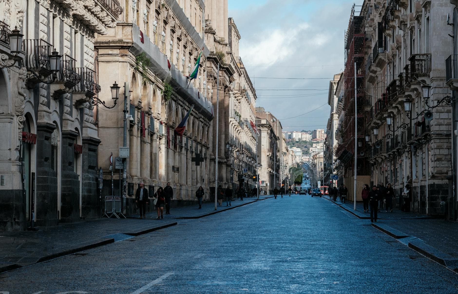 Explore the architectural beauty of a historic street in Catania, Sicily, Italy, captured during the day.