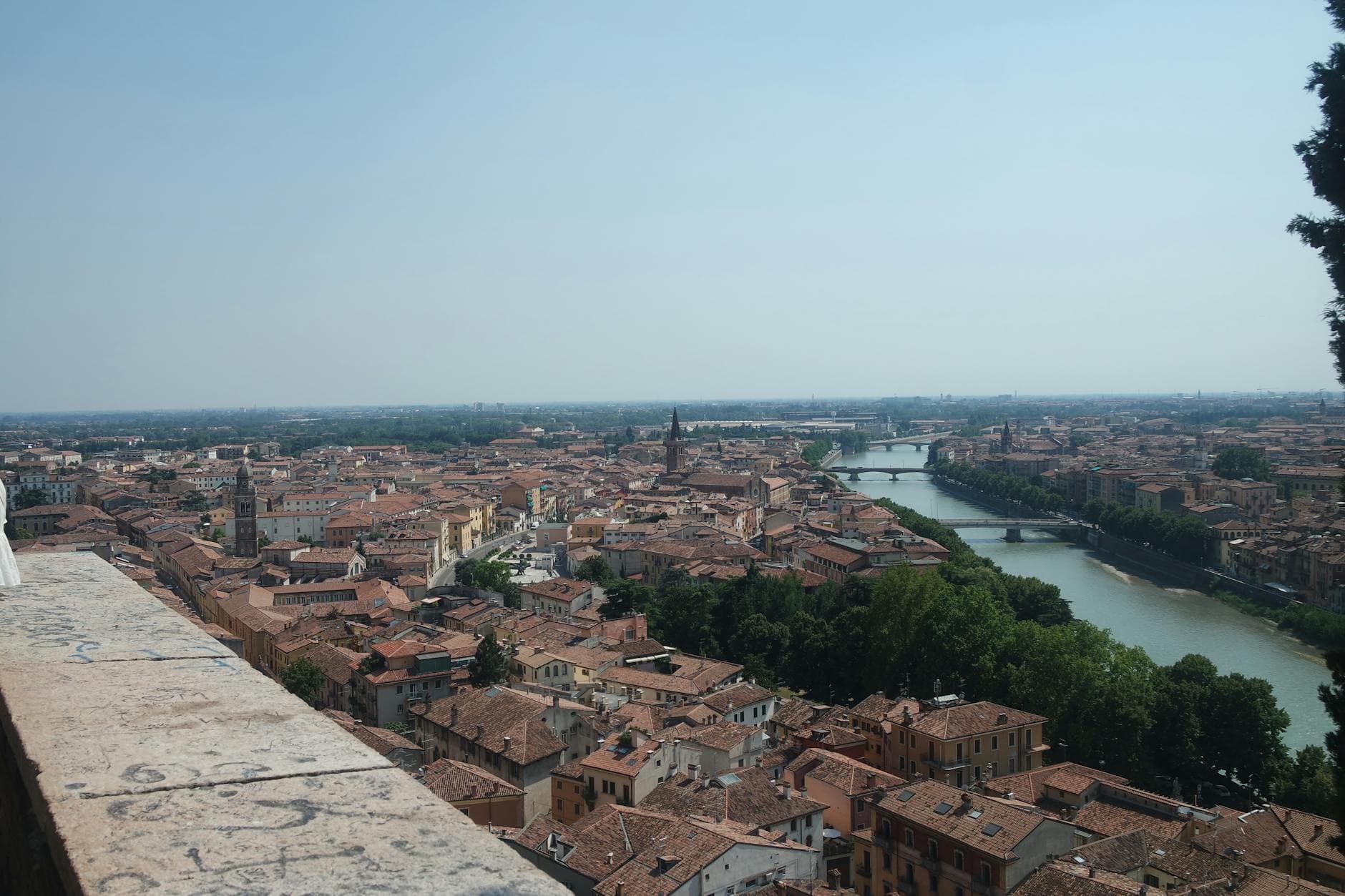 Aerial view of Verona, Italy showcasing its historic architecture and the Adige River.