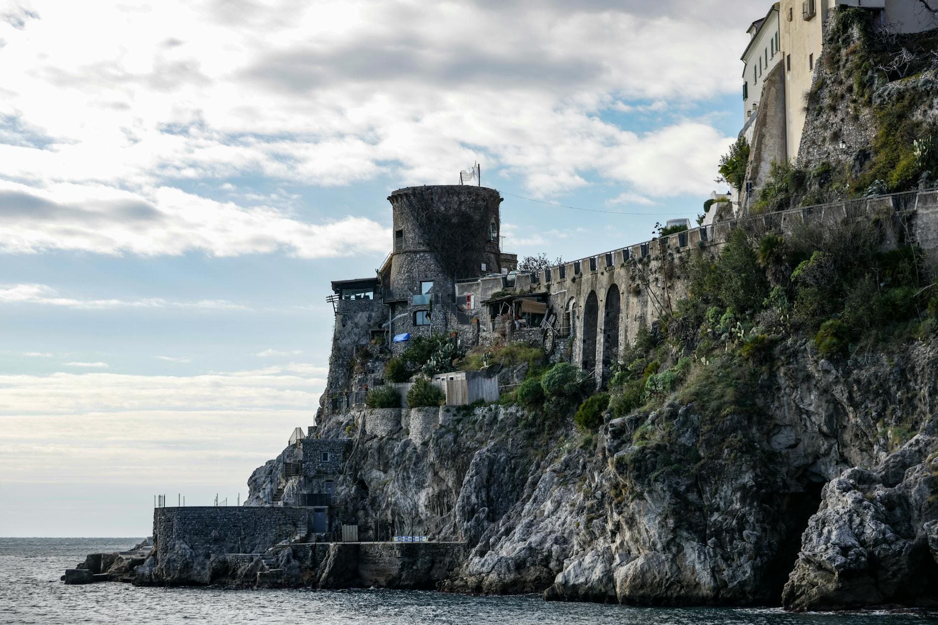 Charming view of historic architecture on the cliffside of Italy's Amalfi Coast.