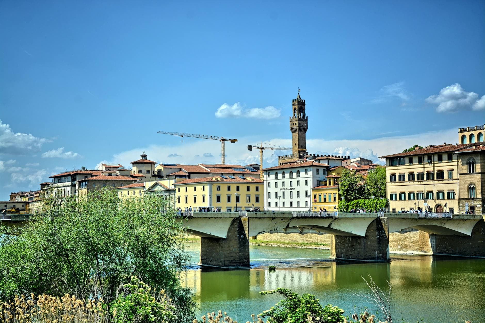 Scenic view of a historic bridge and skyline in Florence, Italy.