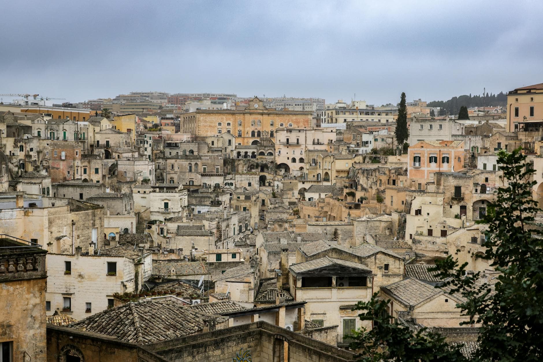 A panoramic view of the ancient cityscape of Matera, showcasing unique architectural styles.