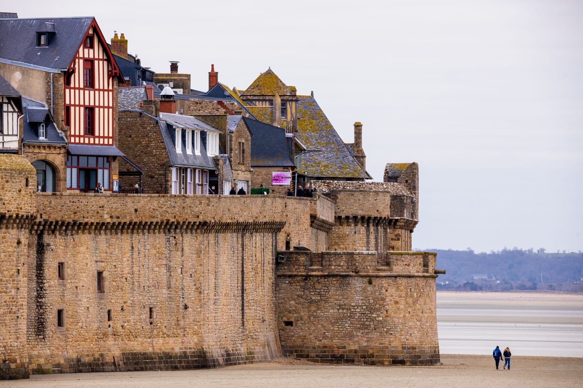 View of the historic fortifications and quaint houses in Saint-Malo, France, near the coast.