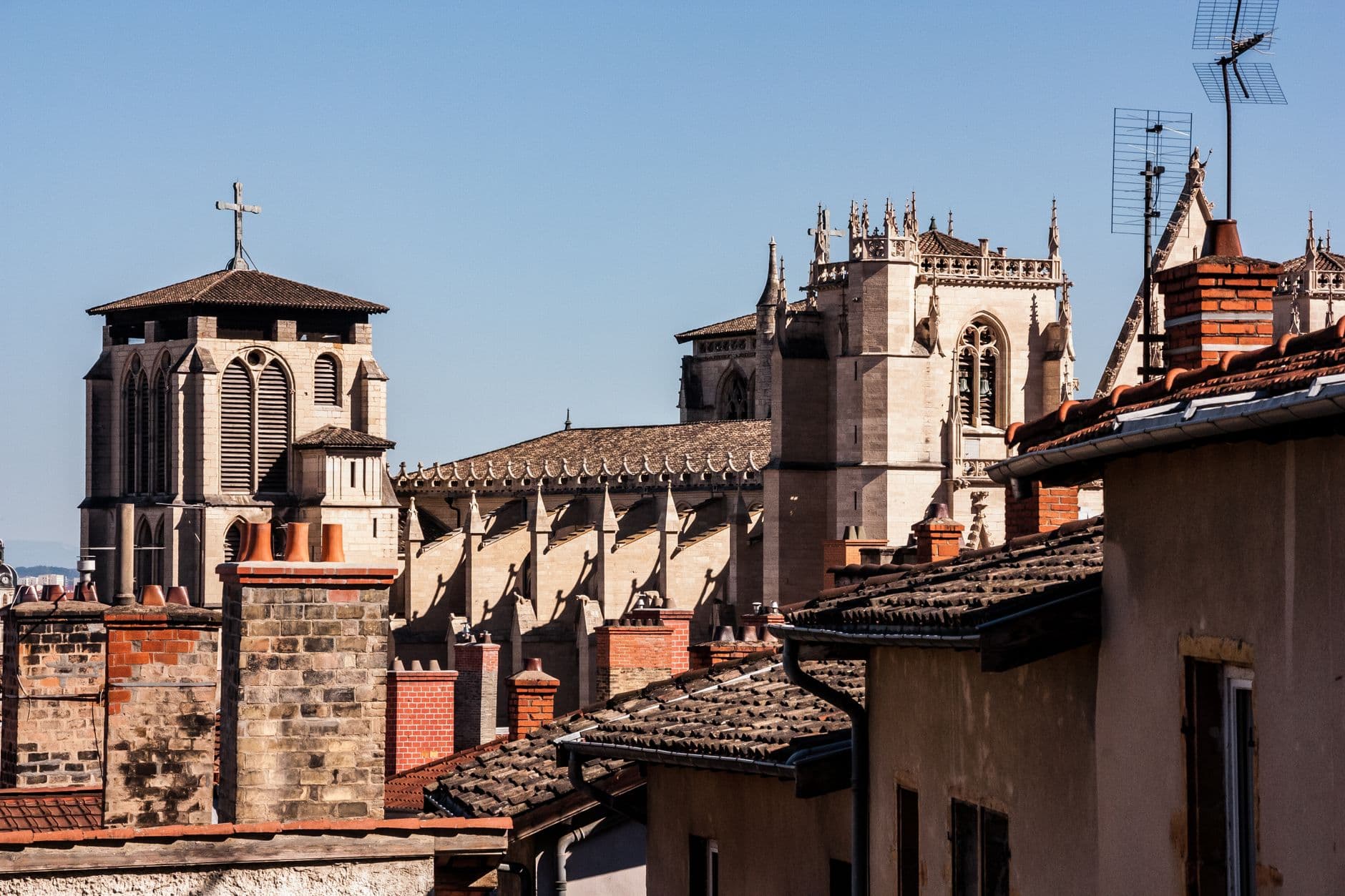 A stunning view of historic cathedrals and rooftops in Lyon, France.