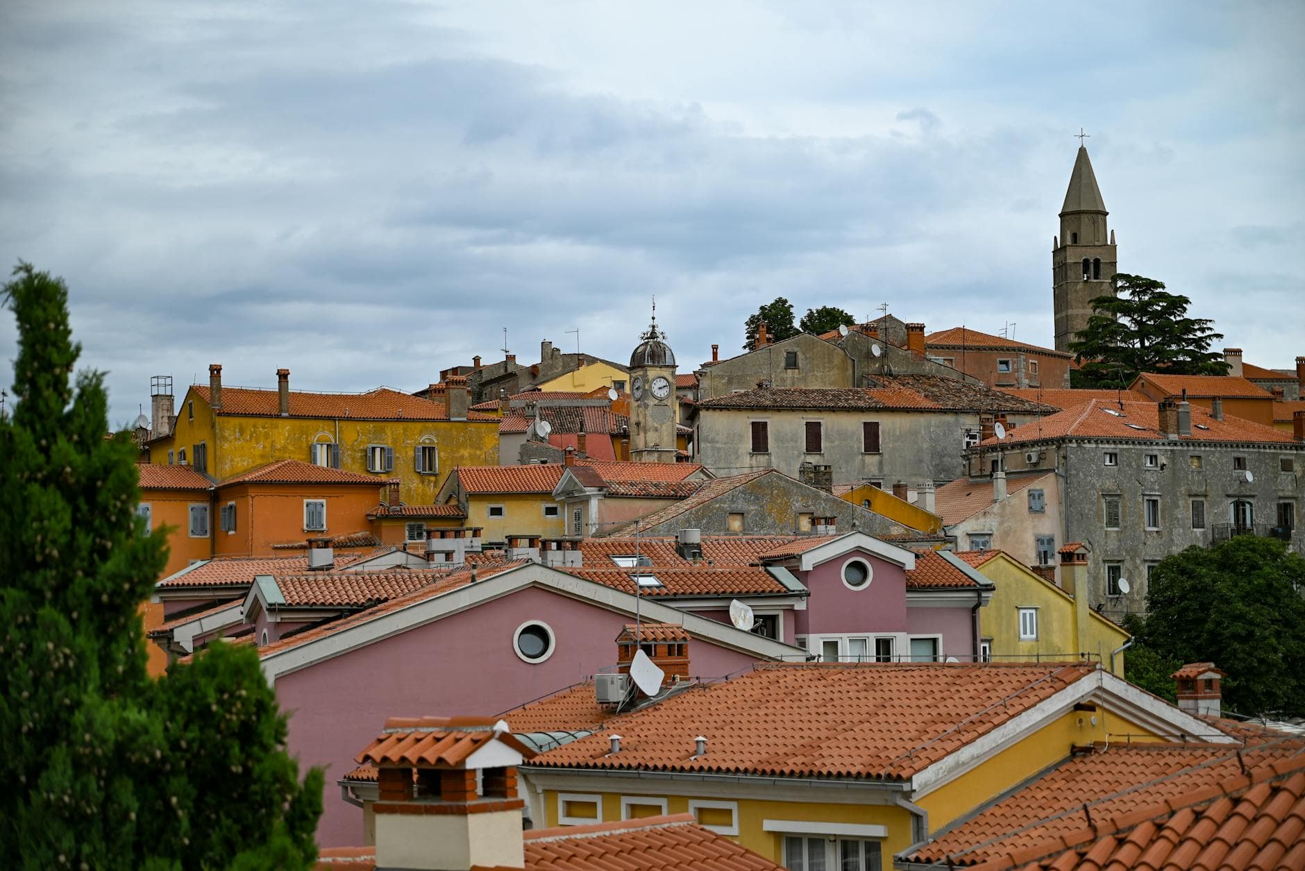 Charming view of Labin's colorful historical buildings and iconic church tower.