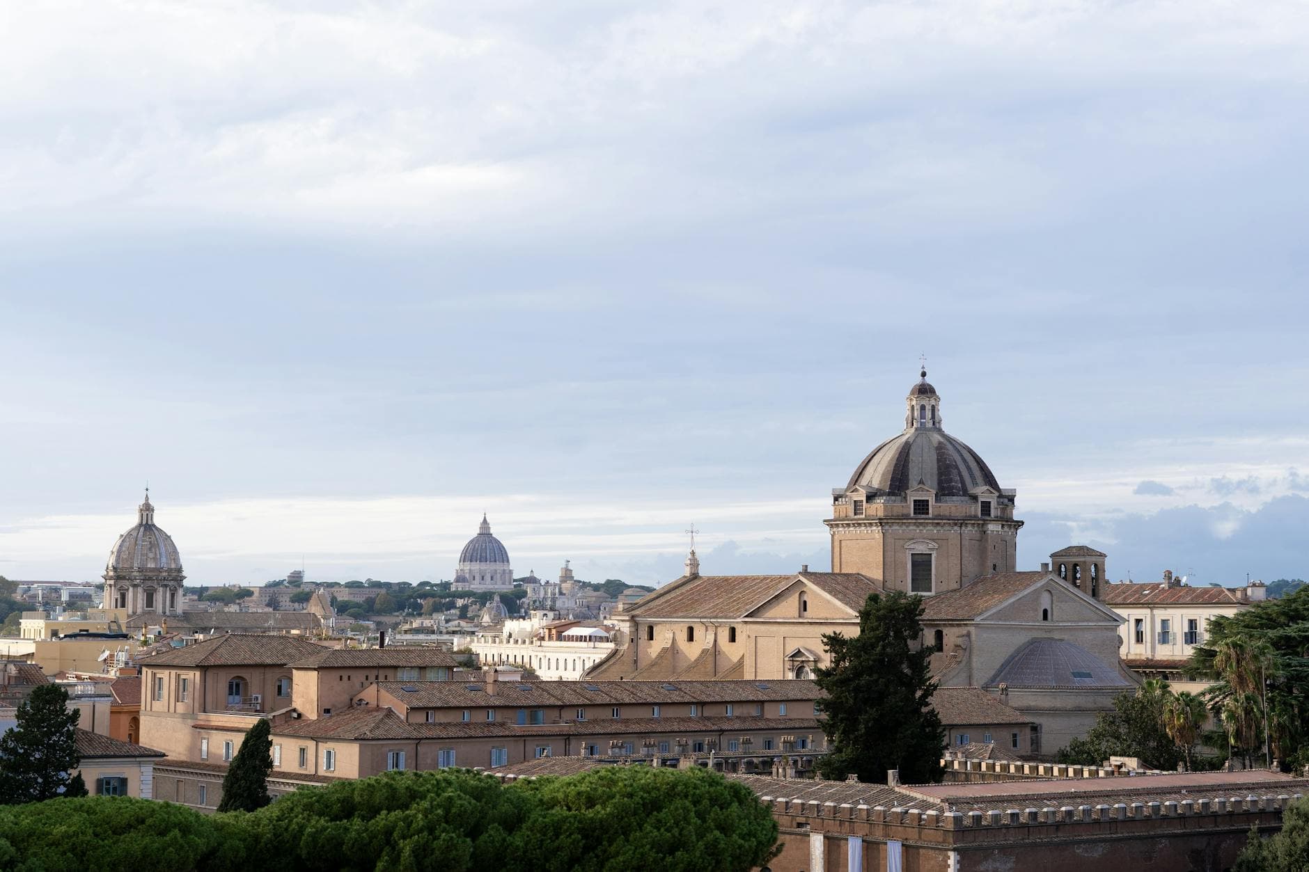 A beautiful aerial view showcasing the historic domes and architecture of Rome, Italy.