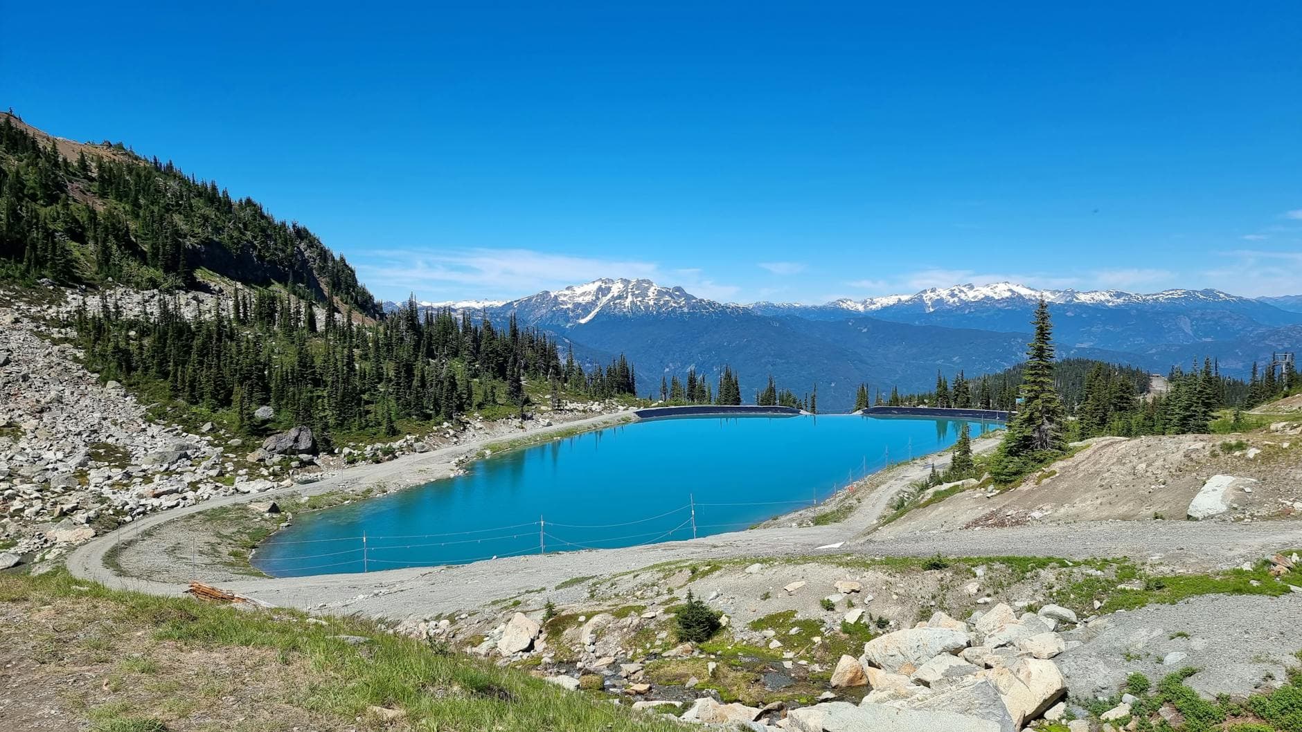 Beautiful alpine lake with mountain views in Whistler, Canada.