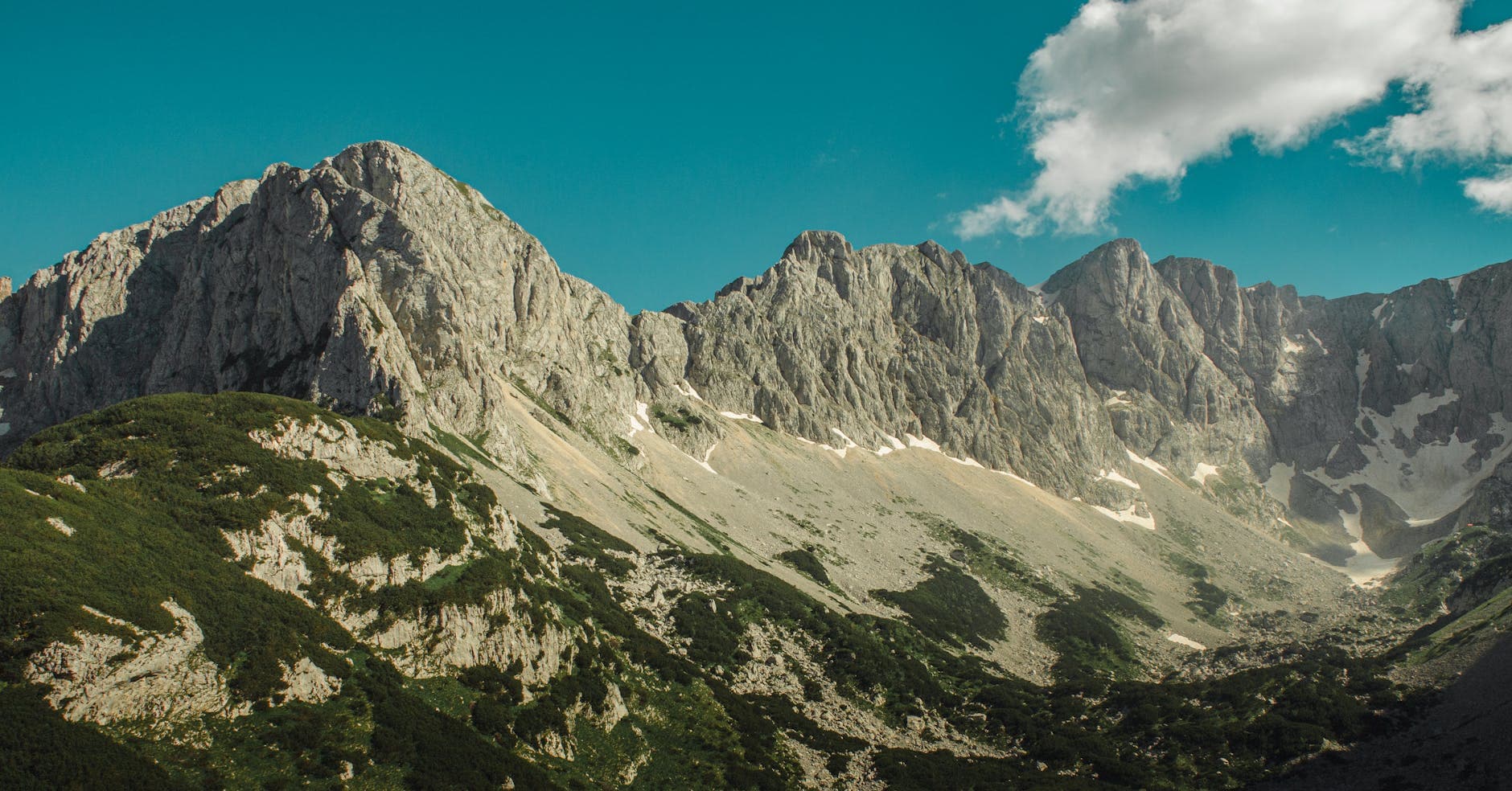 Scenic view of towering mountains in Žabljak, highlighting natural beauty.