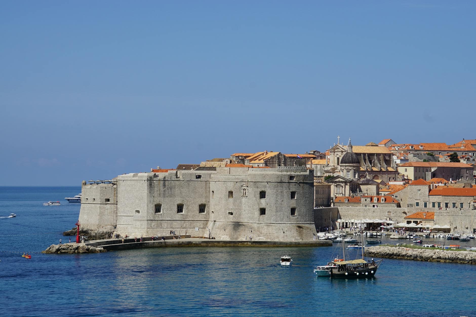 A stunning view of Dubrovnik's Old Town with its iconic medieval architecture by the Adriatic Sea.