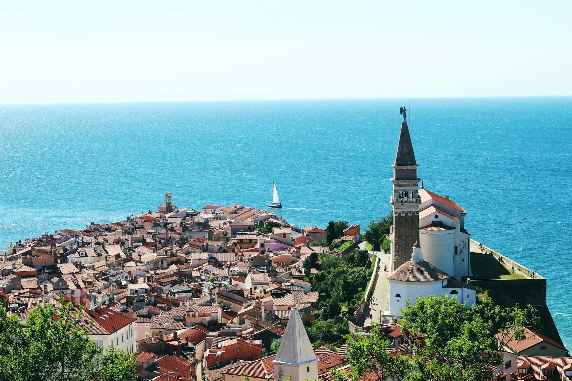 Aerial view of Piran, Slovenia, highlighting its seaside charm and historic architecture.