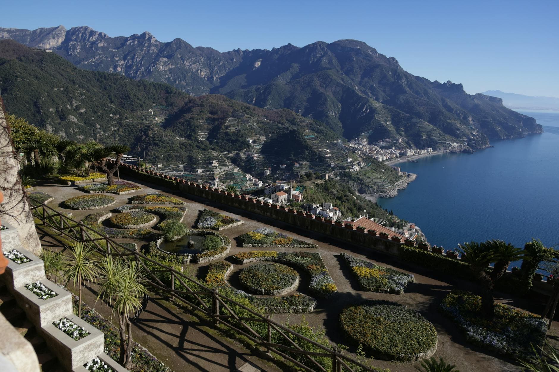 Breathtaking landscape of the Amalfi Coast viewed from a historical garden terrace.