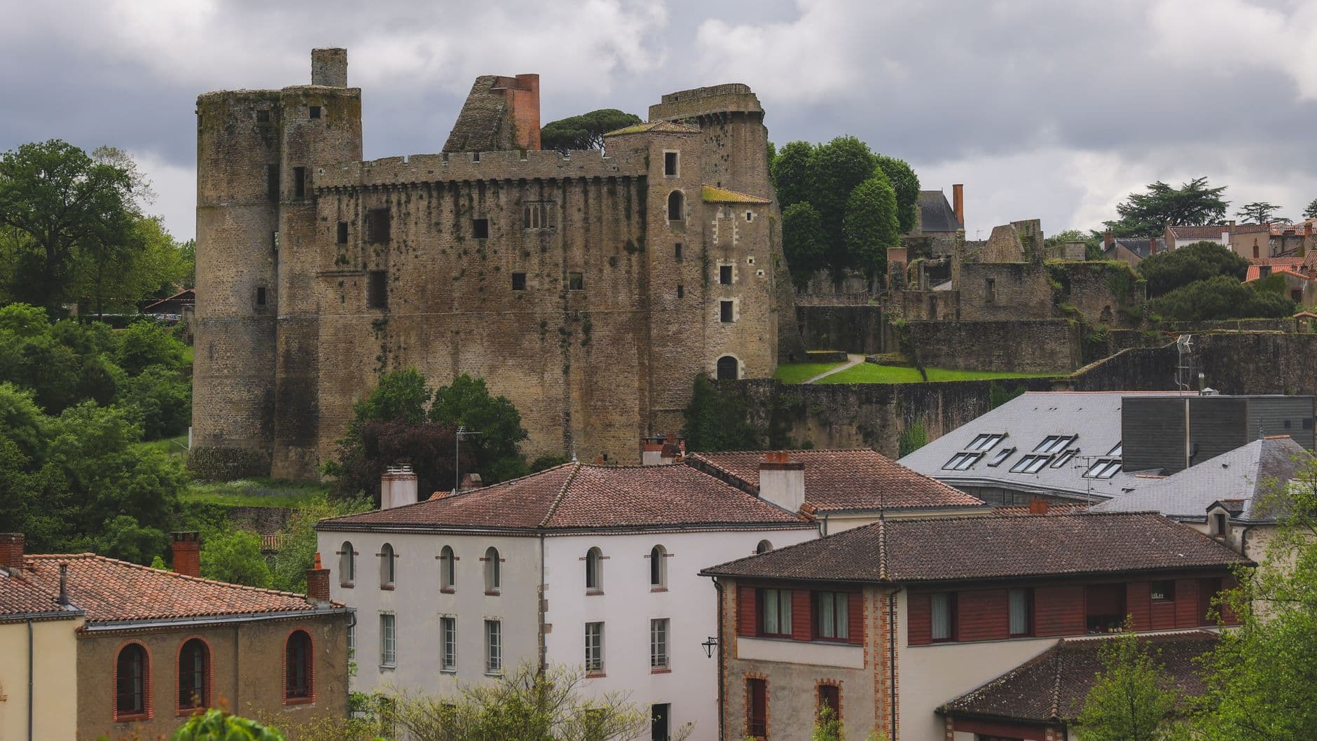 Explore the historic ruins of Clisson Castle with charming town views in Pays de la Loire, France.