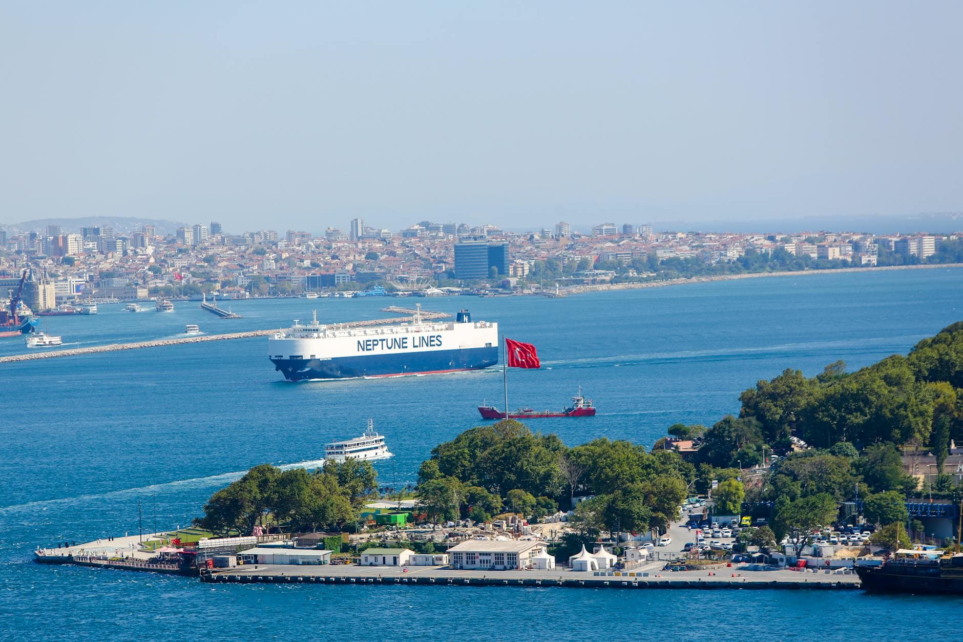 Aerial view of İstanbul harbor with Neptune Lines ship sailing through the Bosphorus.